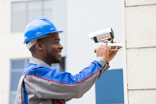 african man installing solar